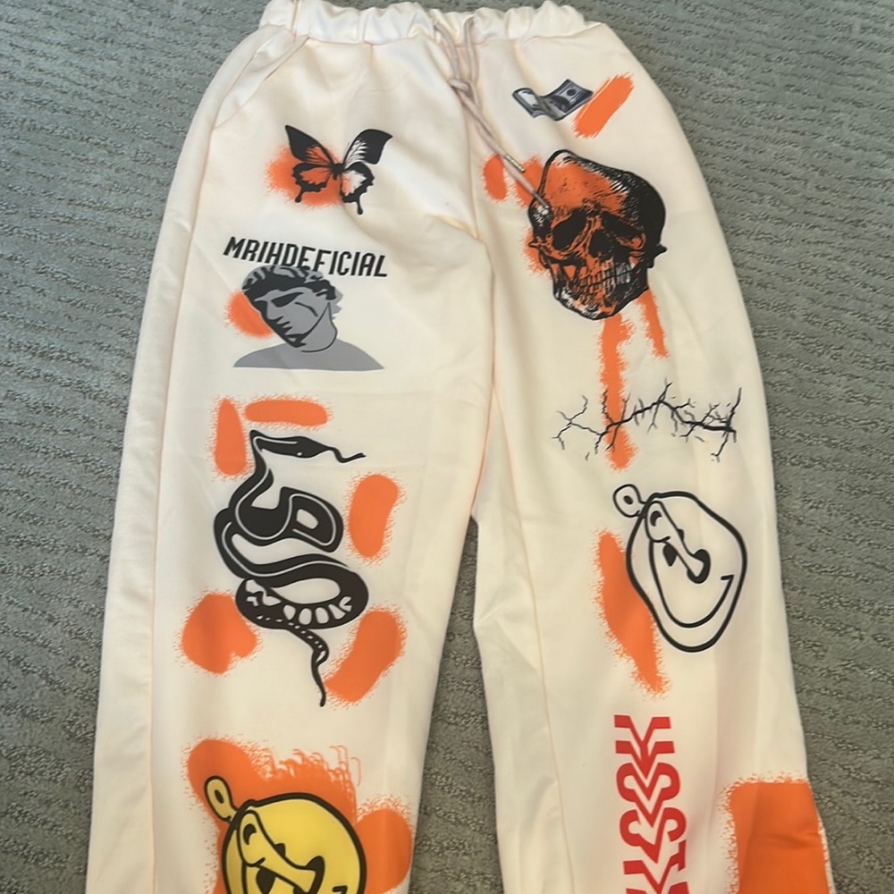 Orange sweatpants from Flamingo with graphic designs! Super comfy. Size S